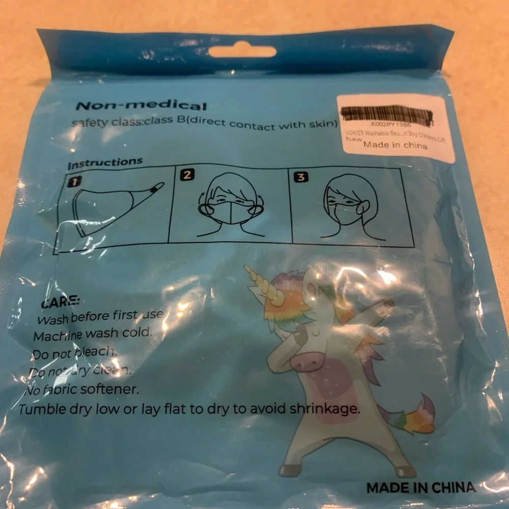 NWOT 4-ok Kids Mask with adjustable ear loops